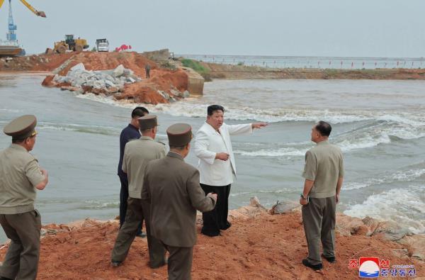 The flooding occurred when an embankment burst due to poor drainage, devastating coastal farms.