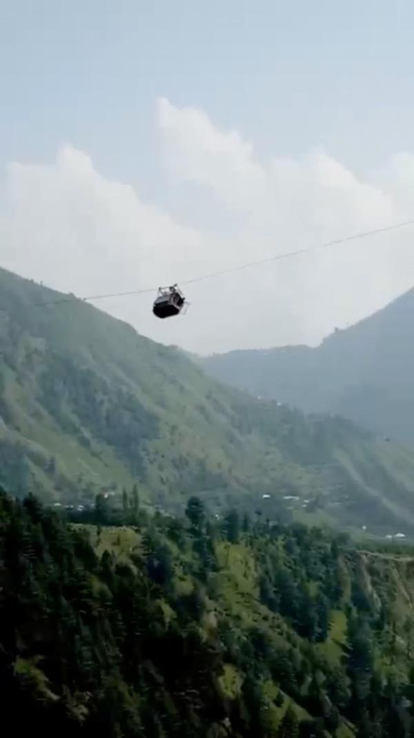 The cable car stranded in mid-air.