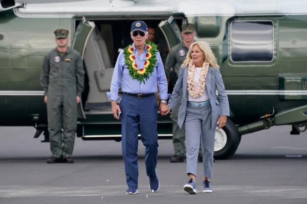 President Joe Biden and first lady Jill Biden walk to board Air Force One after visiting the site of the devastating Maui wildfires and the o<em></em>ngoing recovery efforts, Monday, Aug. 21, 2023, in Kahului, Hawaii.