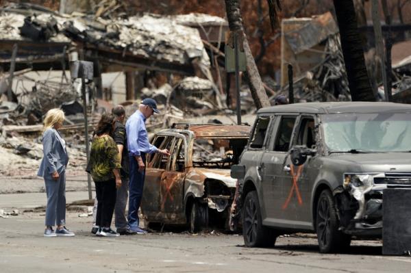  Biden and first lady Jill Biden accompanied by Hawaii Governor Josh Green and Jaime Green, First Lady of Hawaii, visit the fire-ravaged town of Lahaina on the island of Maui in Hawaii, U.S., August 21, 2023.