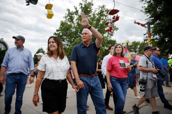 Former Vice President Mike Pence attending the Iowa State Fair with his wife Karen and Iowa Sen. Joni Ernst on August 11, 2023.