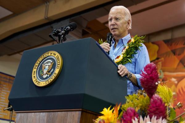 President Joe Biden speaks as he meets with community members impacted by the Maui wildfires at Lahaina Civic Center