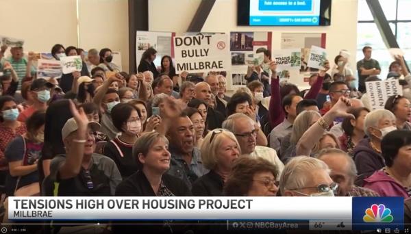 Residents of the town of Millbrae in the San Francisco Bay Area at a town meeting to protest a plan to turn a hotel into housing for the homeless.