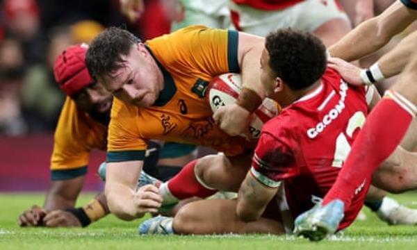 Australia’s Matt Faessler crosses the line to score one of his tries in Cardiff.