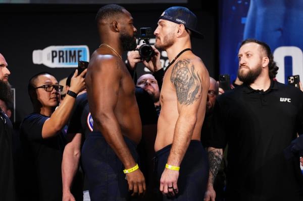 Oppo<em></em>nents Jon Jo<em></em>nes and Stipe Miocic face off during the UFC 309 ceremo<em></em>nial weigh-in at The Theater at Madison Square Garden on November 15, 2024 in New York City. 